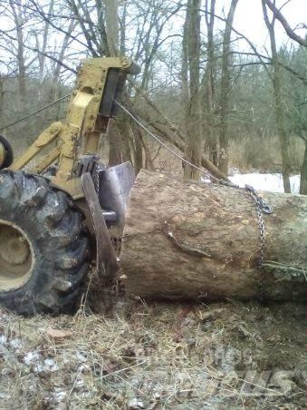 CAT 515 Skidder Carregadoras de direcção deslizante