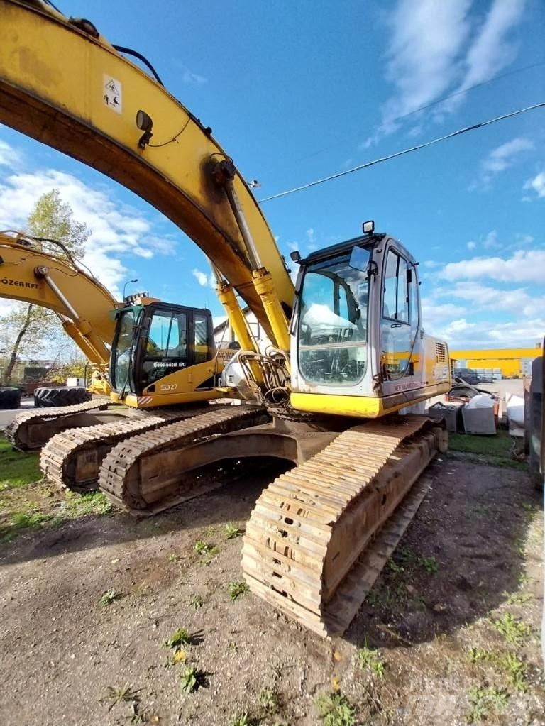 New Holland E 305 Escavadoras de rastos