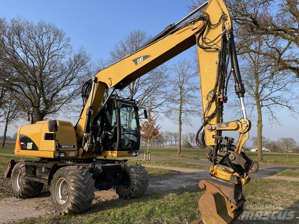 CAT M 313 D Escavadoras de rodas