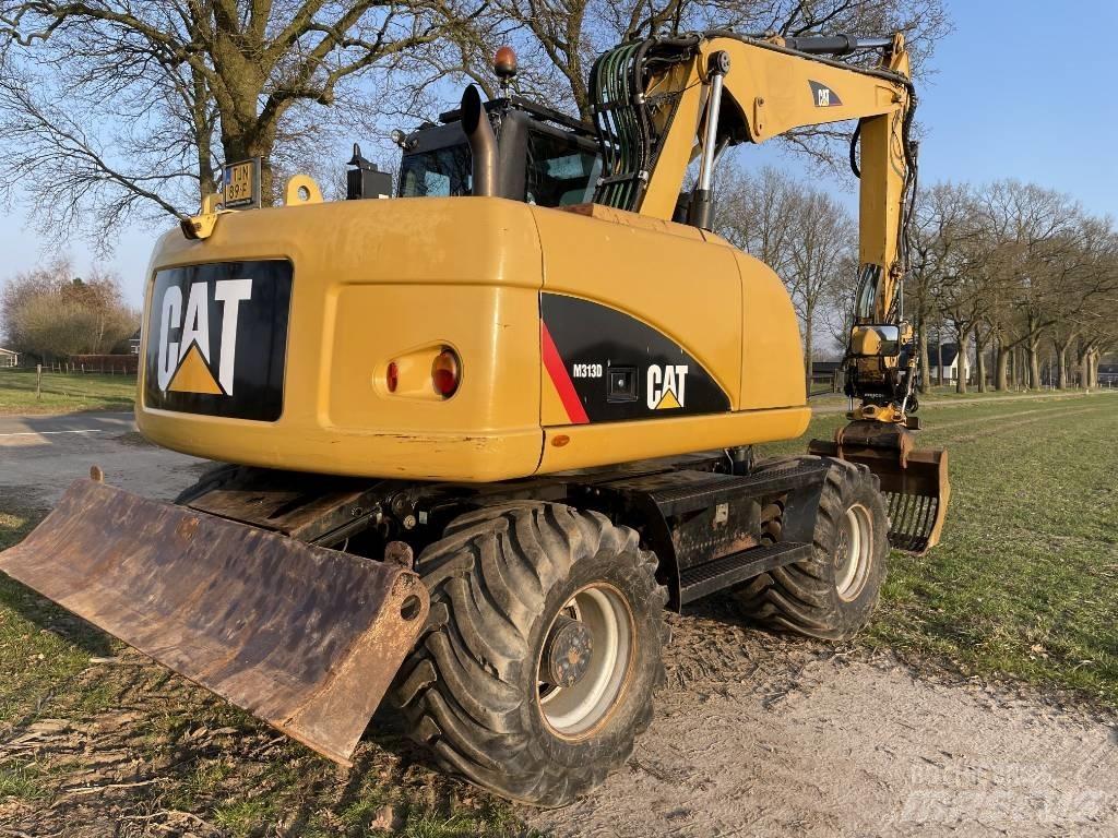 CAT M 313 D Escavadoras de rodas
