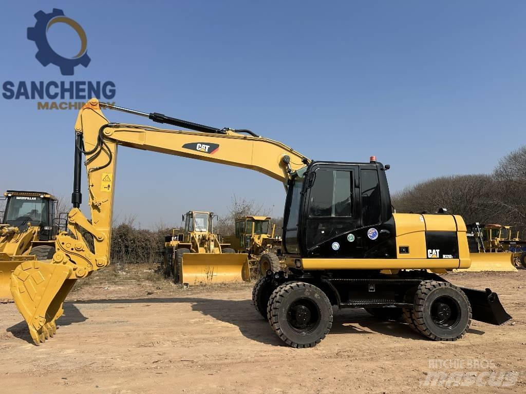 CAT M 320 D2 Escavadoras de rodas