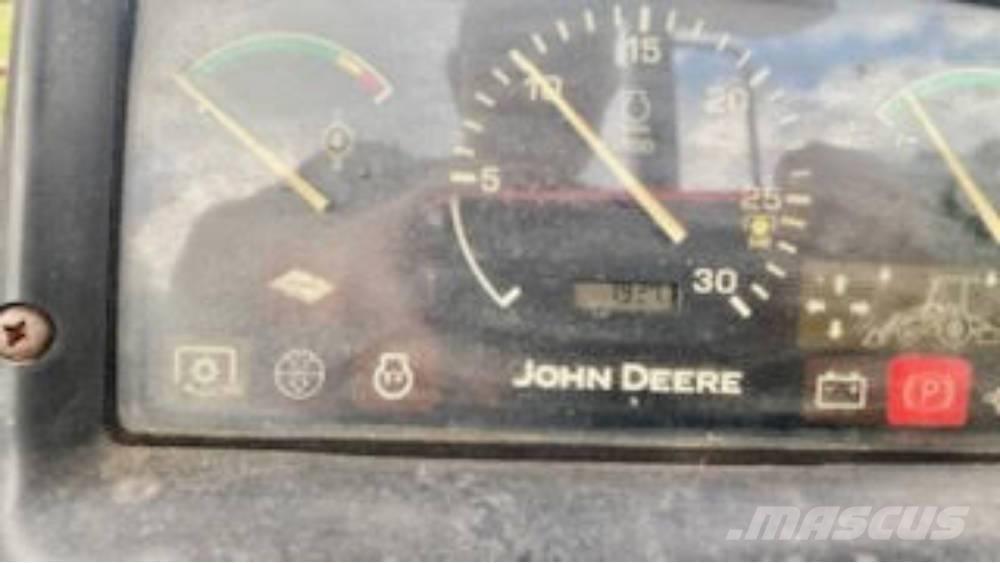 John Deere 110 Retroescavadoras