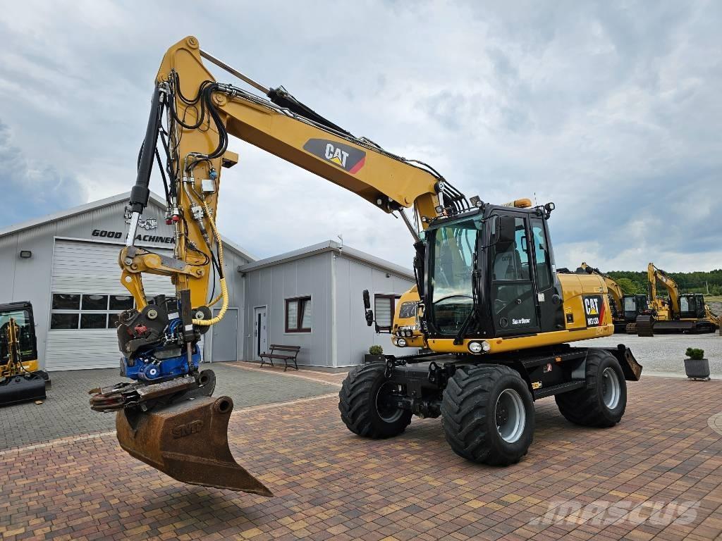 CAT M 313 D Escavadoras de rodas