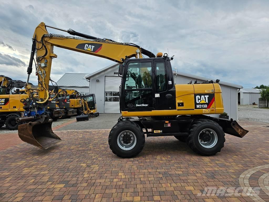 CAT M 313 D Escavadoras de rodas