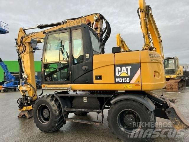 CAT M 313 D Escavadoras de rodas