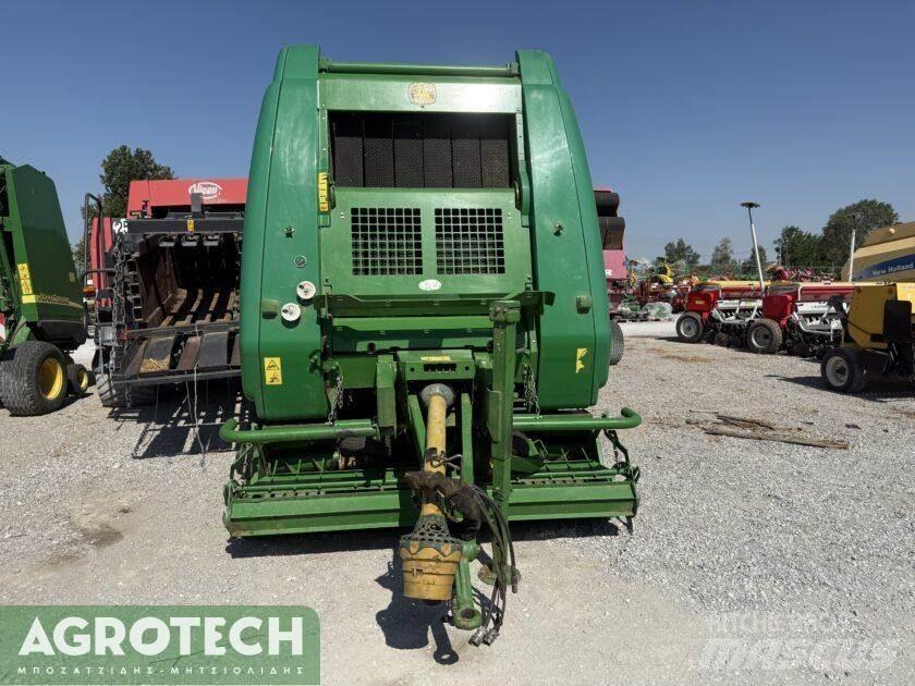 John Deere 864 Enfardadeira de rolos
