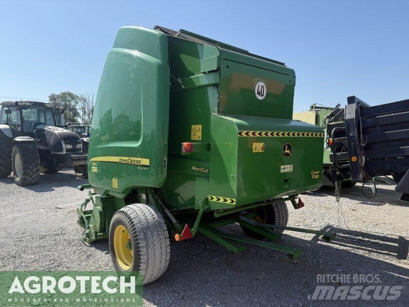 John Deere 864 Enfardadeira de rolos