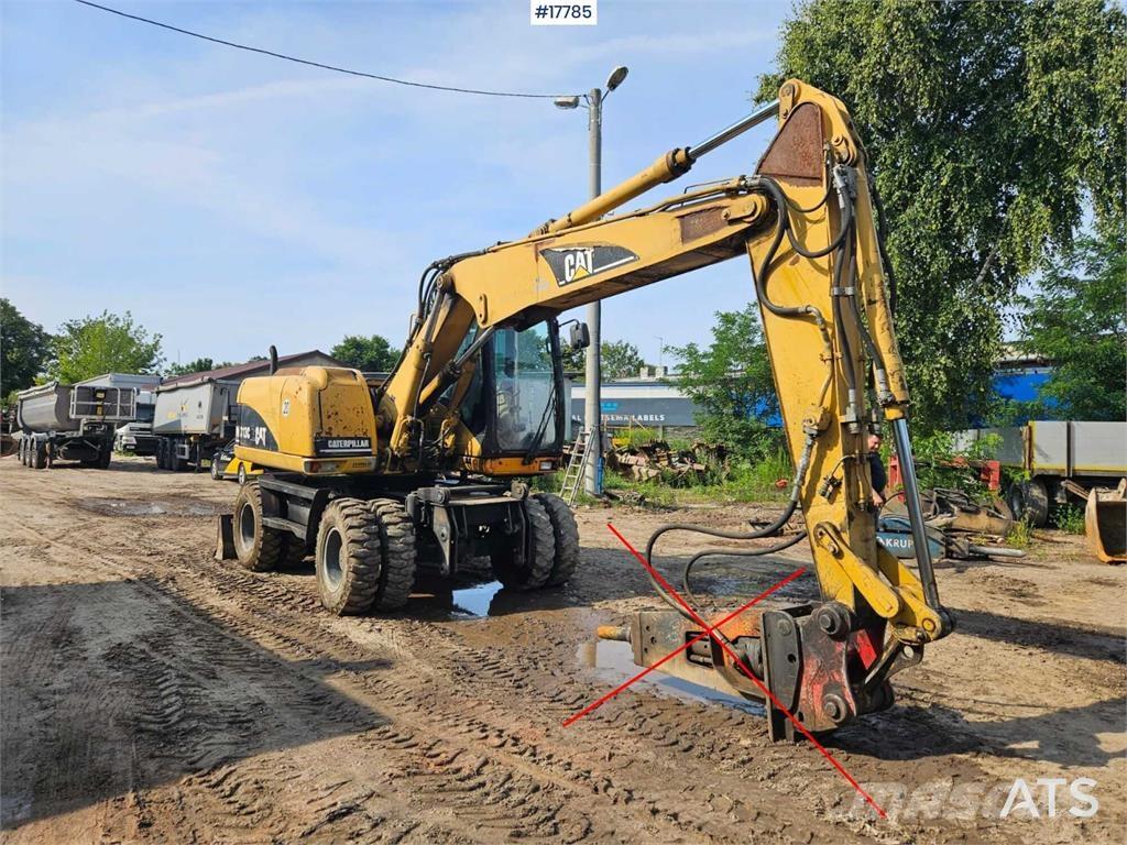 CAT M313 C Escavadoras de rodas
