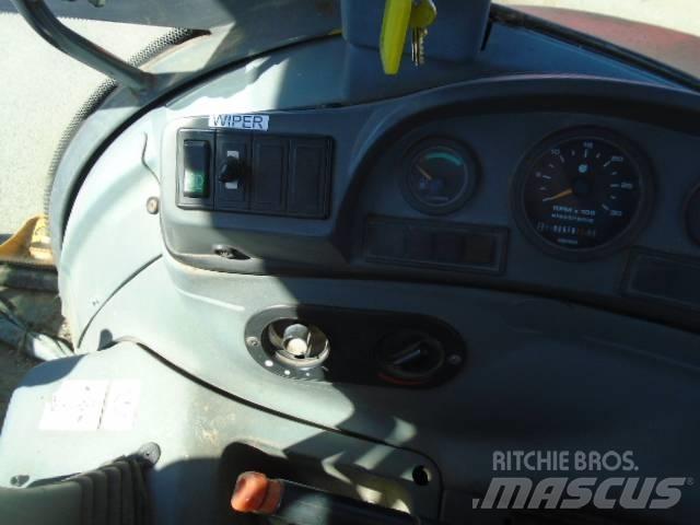 New Holland 575 E Retroescavadoras
