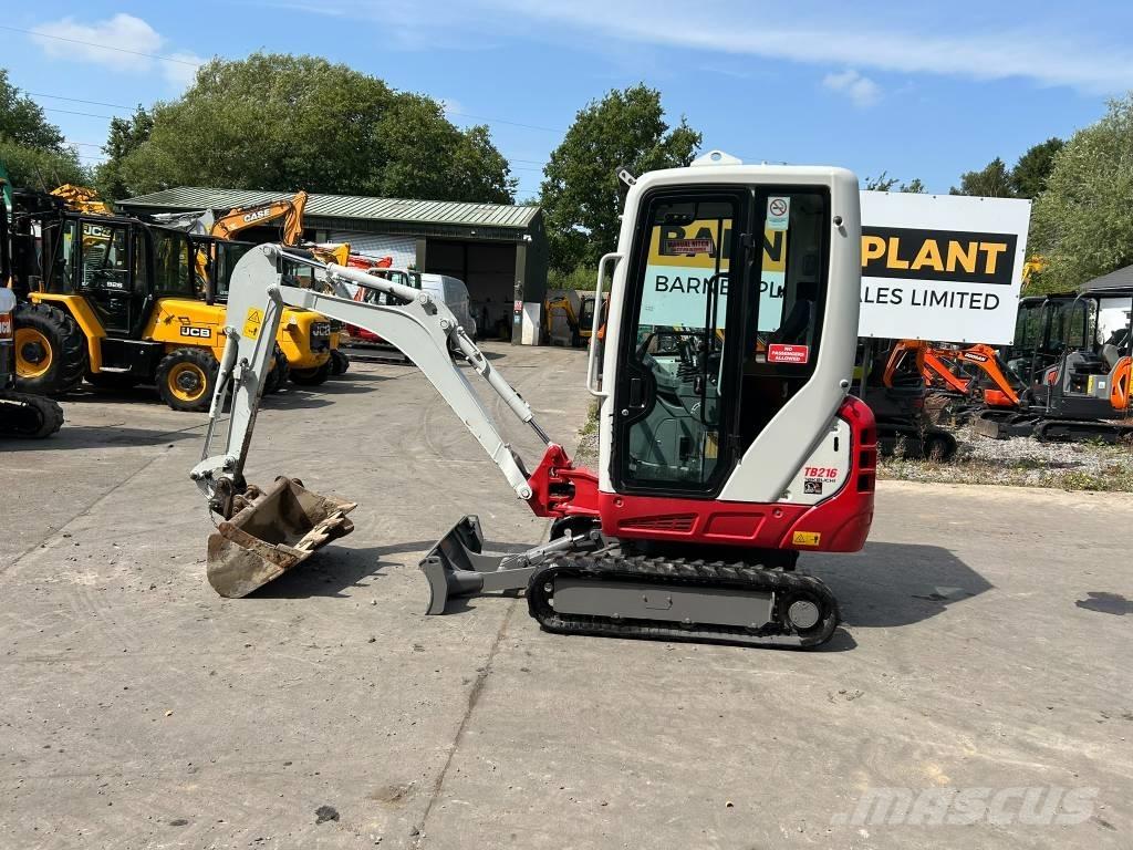 Takeuchi TB 216 Carregadoras de direcção deslizante
