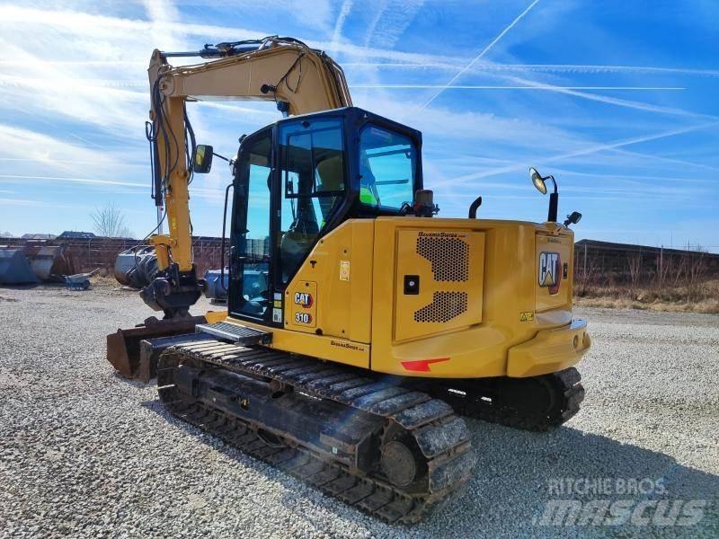 CAT 310-07A Escavadoras de rastos