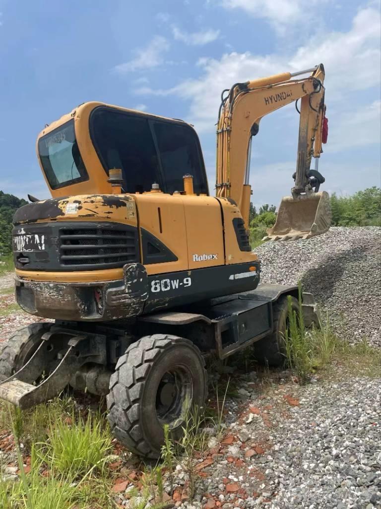 Hyundai 60 W VS Escavadoras de rastos