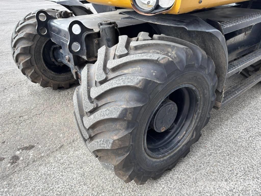 CAT M 313 D Escavadoras de rodas