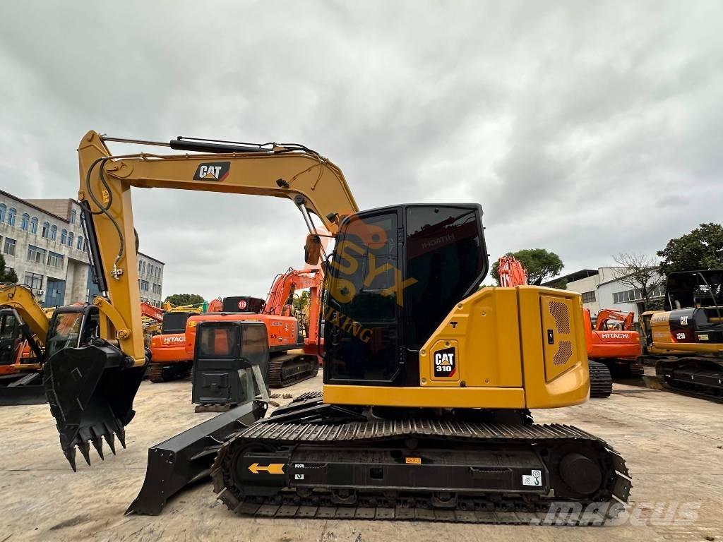 CAT 310 Escavadoras de rastos