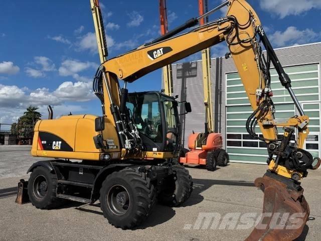 CAT M 313 D Escavadoras de rodas