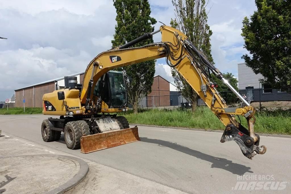 CAT M313 D Escavadoras de rodas