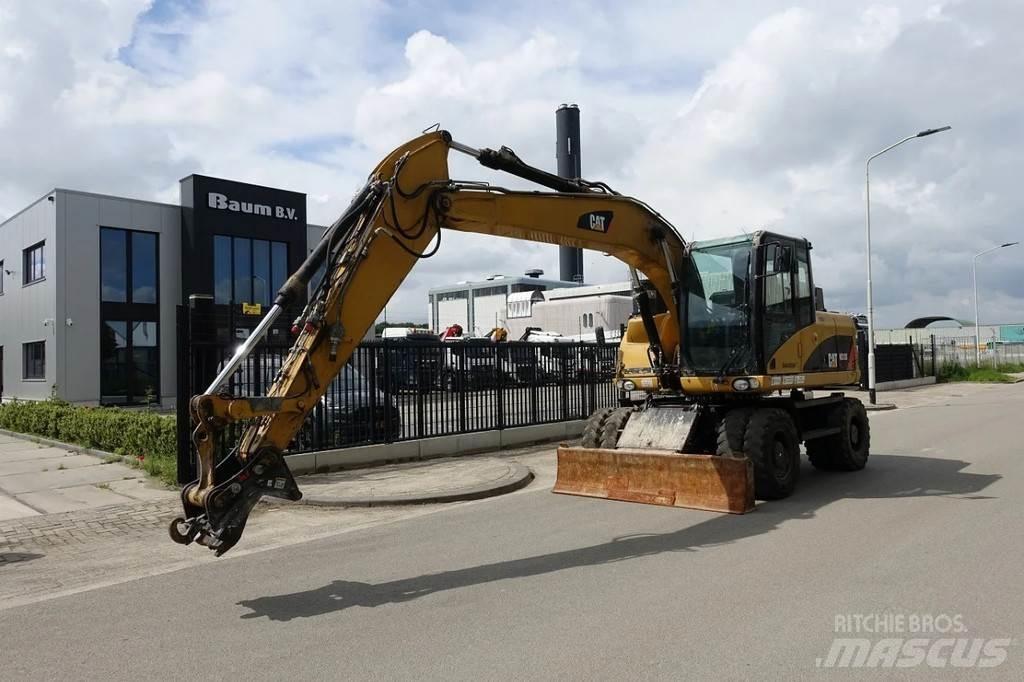 CAT M313 D Escavadoras de rodas