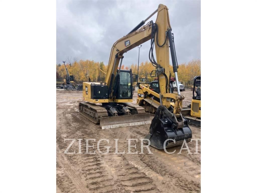 CAT 310 Escavadoras de rastos