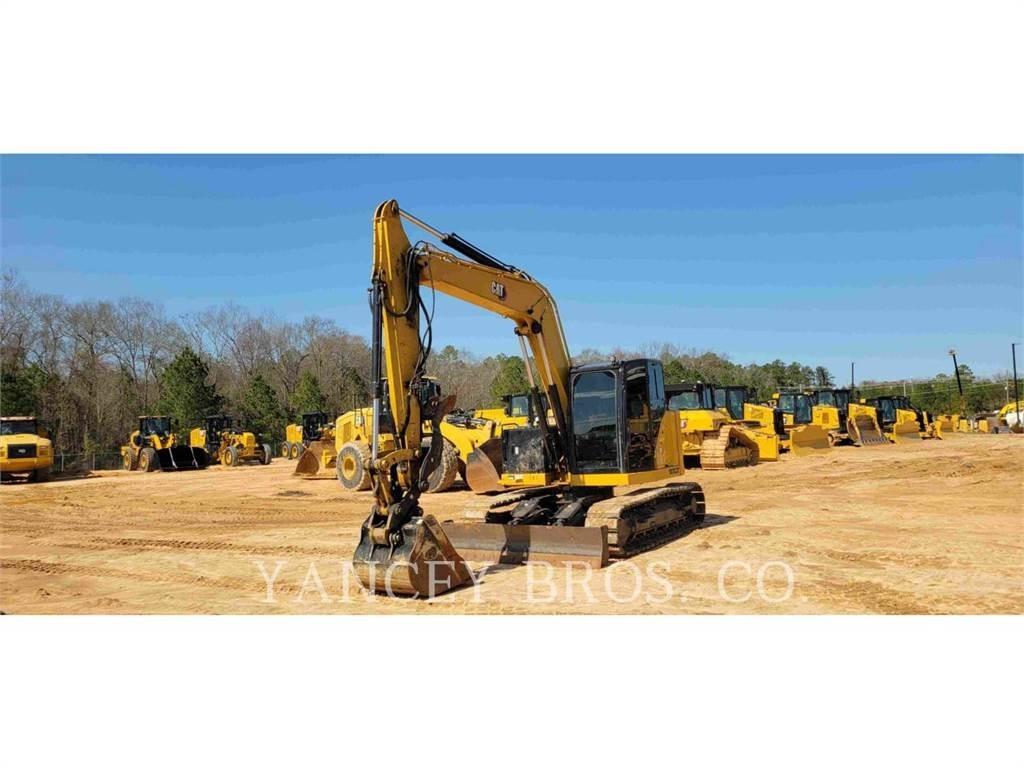 CAT 310 Escavadoras de rastos