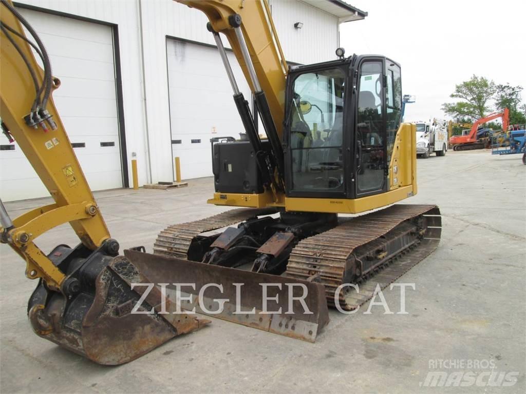 CAT 310 Escavadoras de rastos