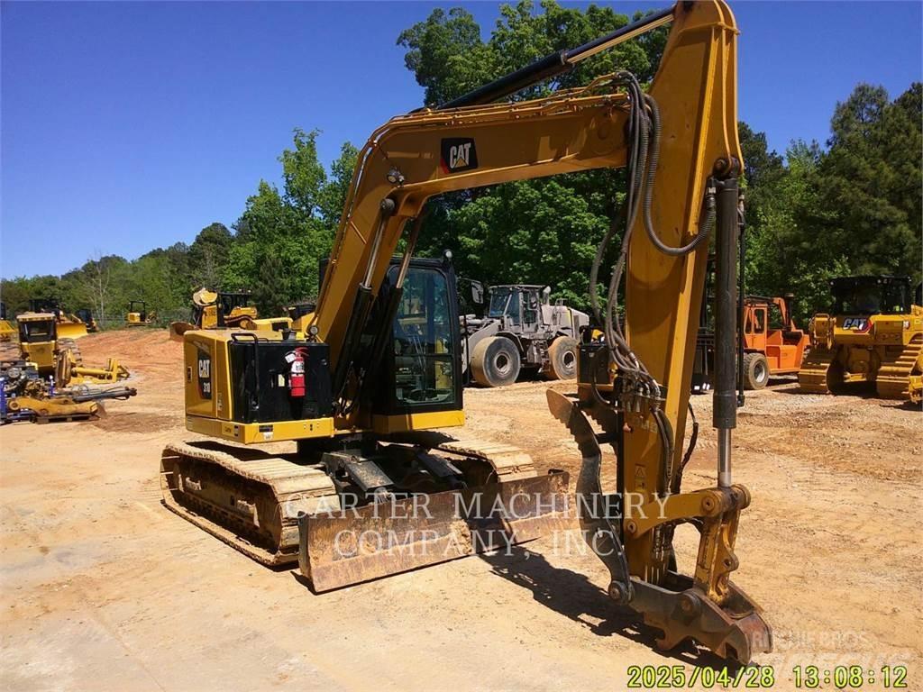 CAT 310 Mini Escavadoras <7t