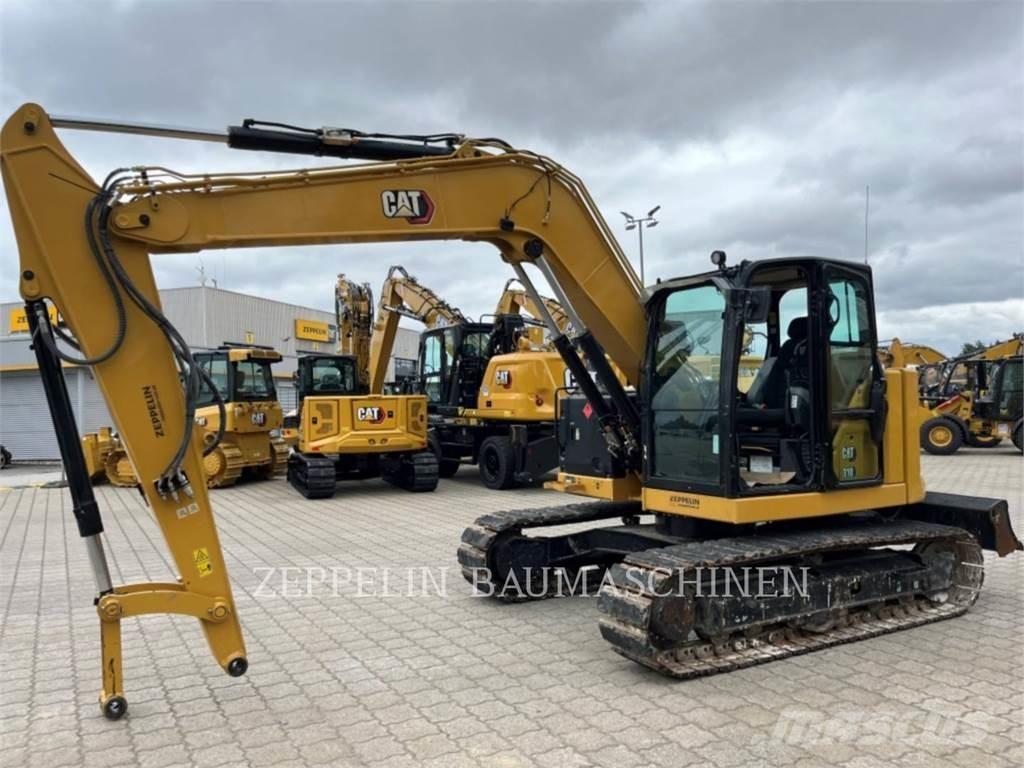 CAT 310 Escavadoras de rastos
