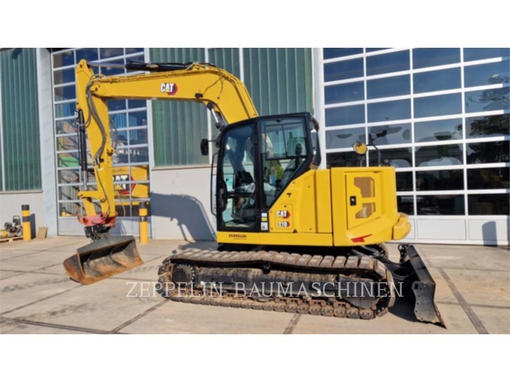 CAT 310 Escavadoras de rastos