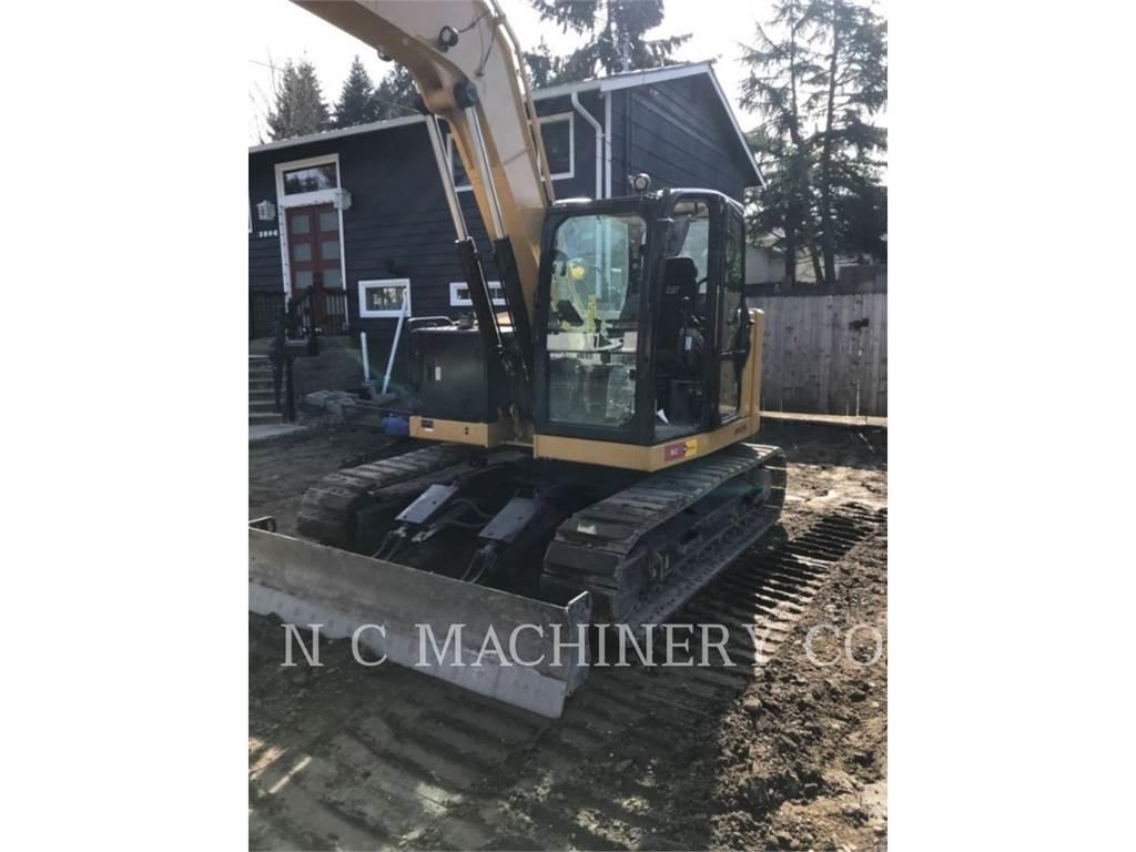 CAT 310 Escavadoras de rastos