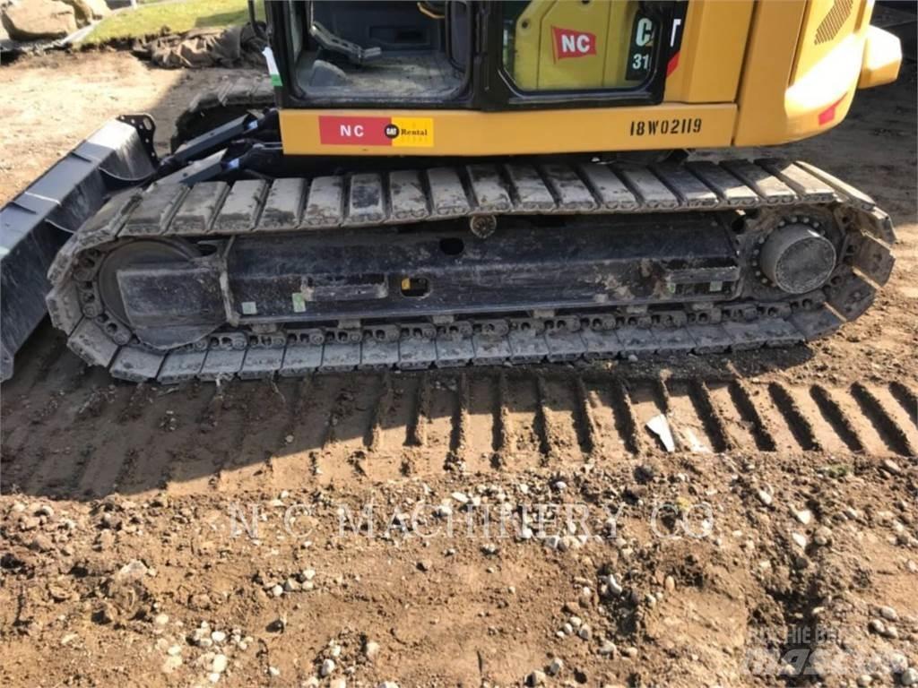 CAT 310 Escavadoras de rastos