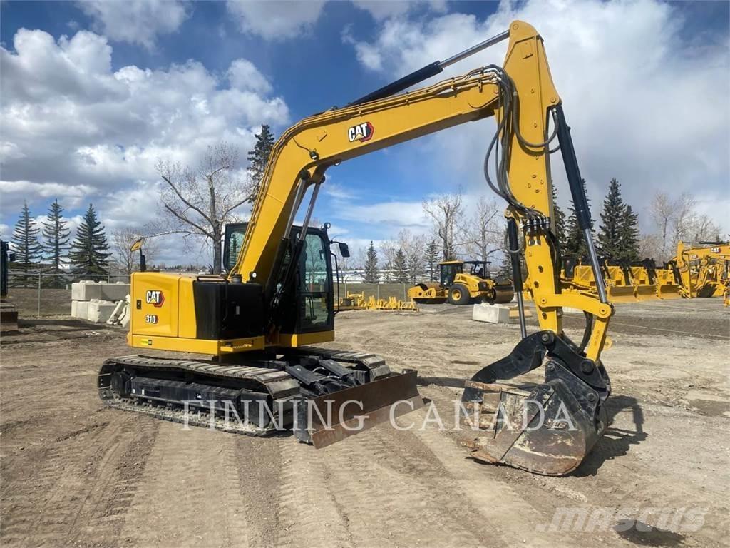 CAT 310-07 Escavadoras de rastos
