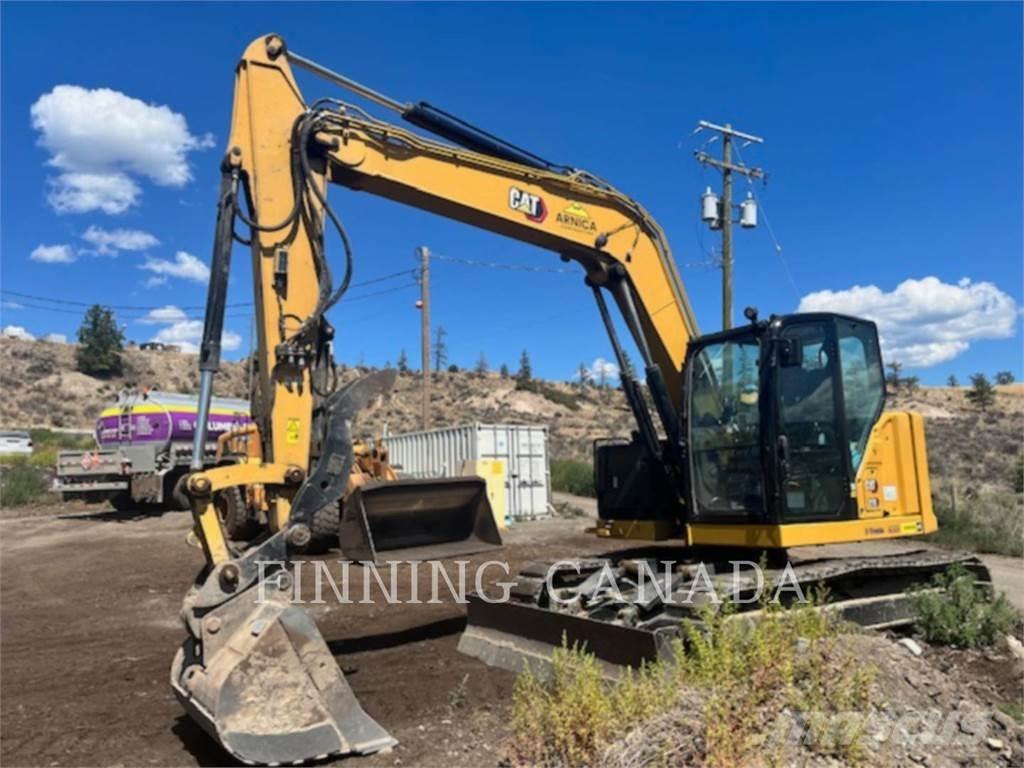 CAT 310-07 Escavadoras de rastos
