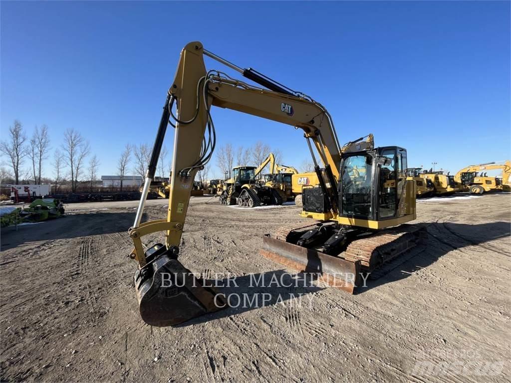 CAT 310-07A Escavadoras de rastos