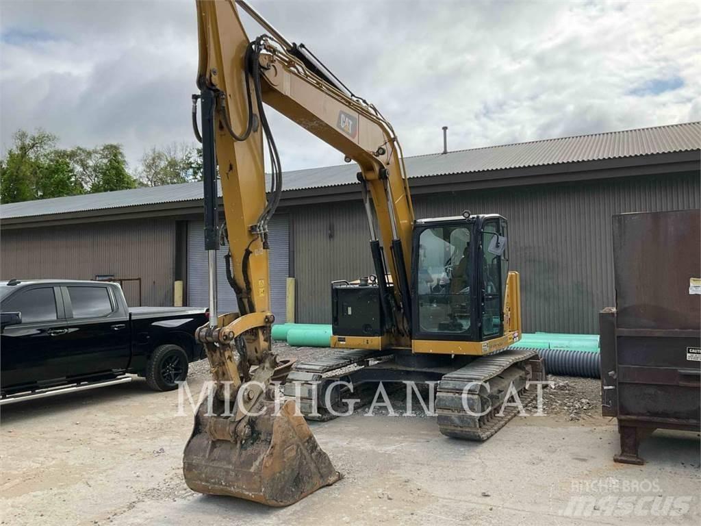 CAT 310 AQ Escavadoras de rastos