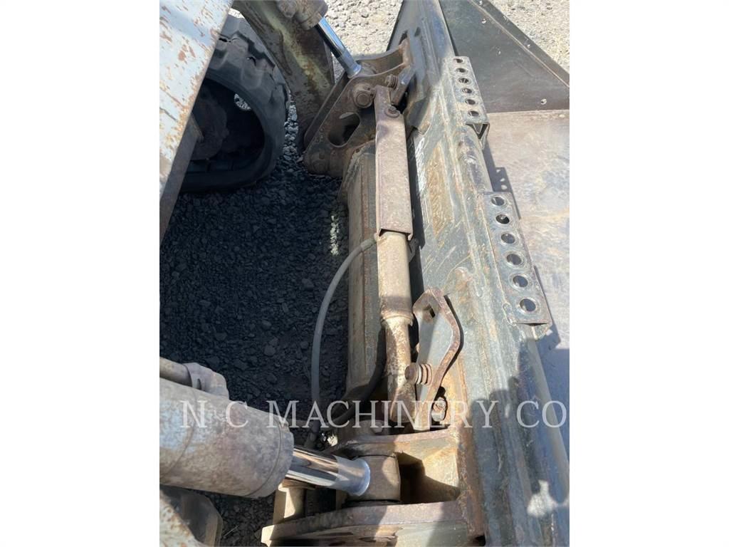 Takeuchi TL230 Carregadoras de direcção deslizante