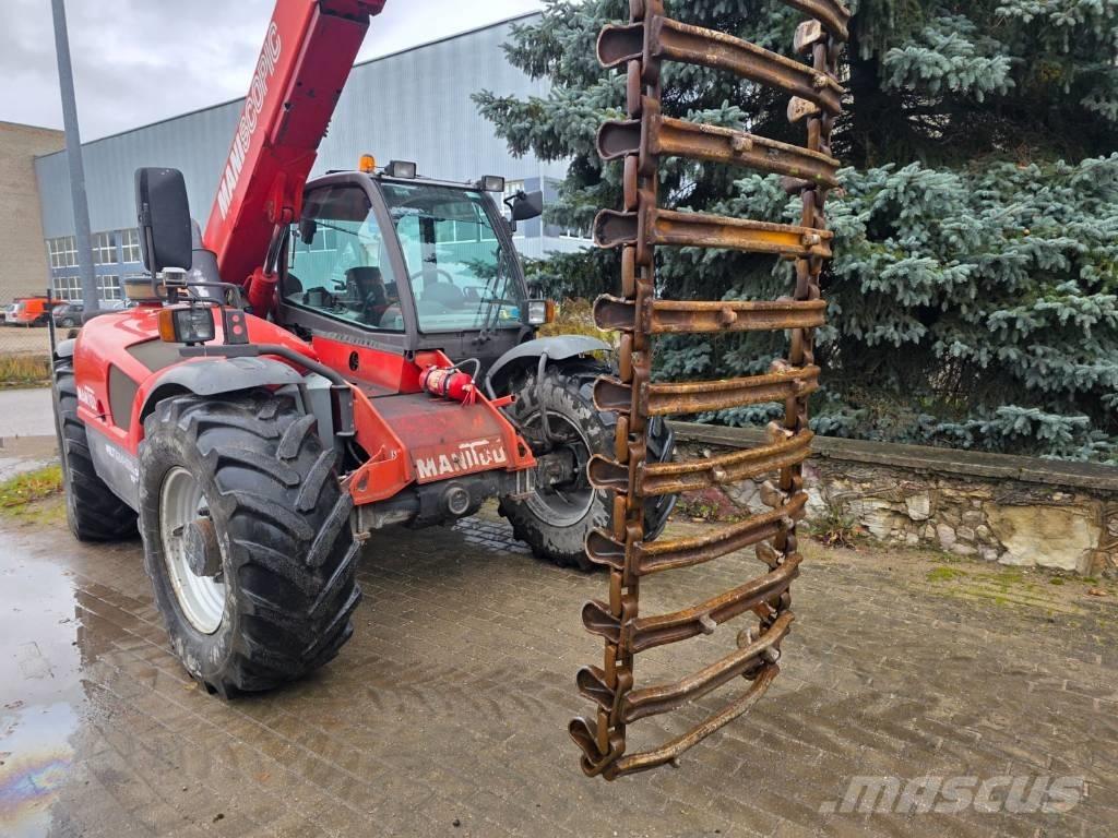 Clark Terra Rastos, correntes e material rodante