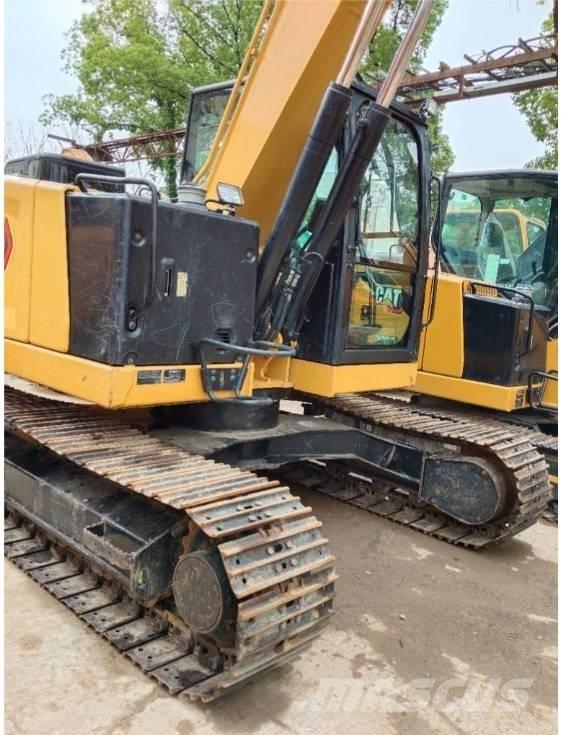 CAT 310 Escavadoras de rastos