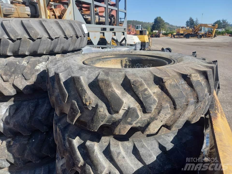 CAT M320F Rastos, correntes e material rodante