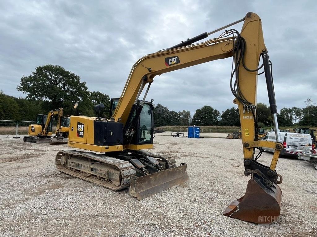CAT 310 Escavadoras Midi 7t - 12t