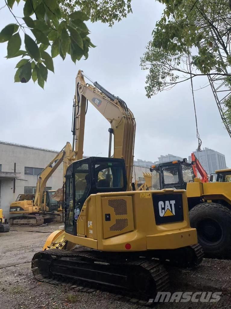 CAT 310 Escavadoras de rastos