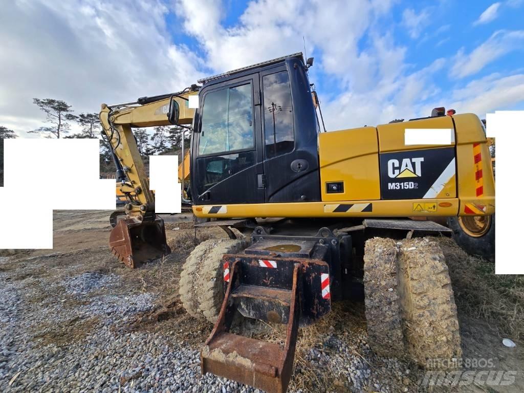 CAT M 315 D Escavadoras de rodas