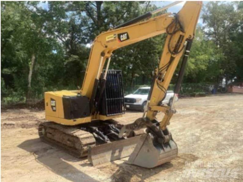 CAT 310 Escavadoras de rastos