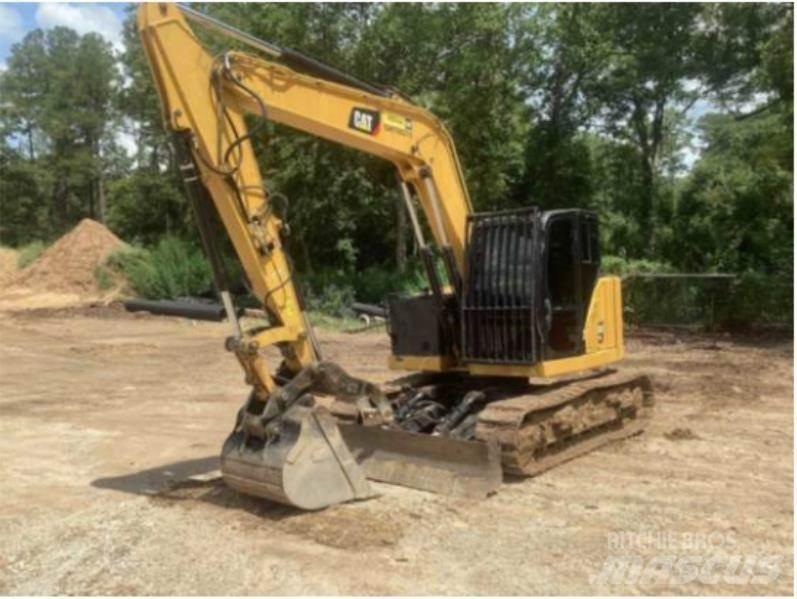 CAT 310 Escavadoras de rastos