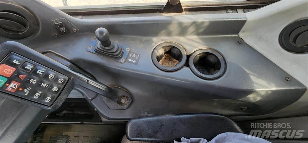 John Deere 460E Auto-tanques