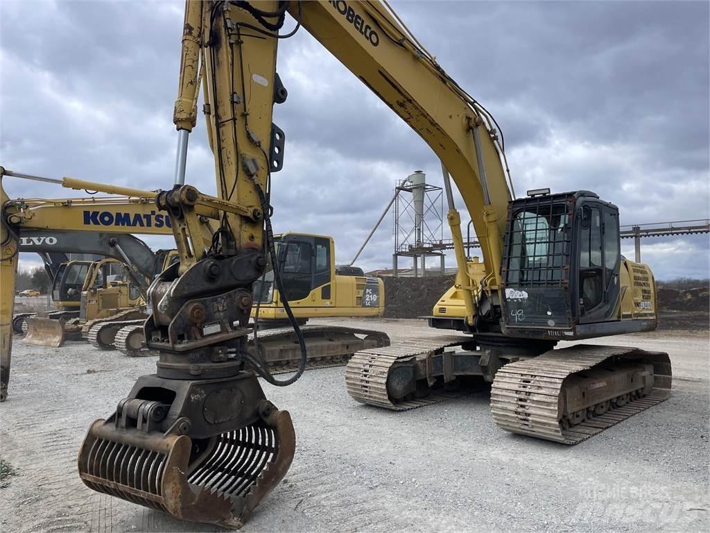 Kobelco SK210 LC-9 Carregadores