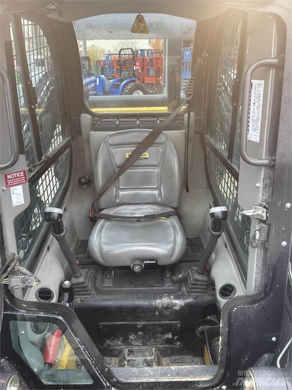 New Holland C237 Carregadoras de direcção deslizante
