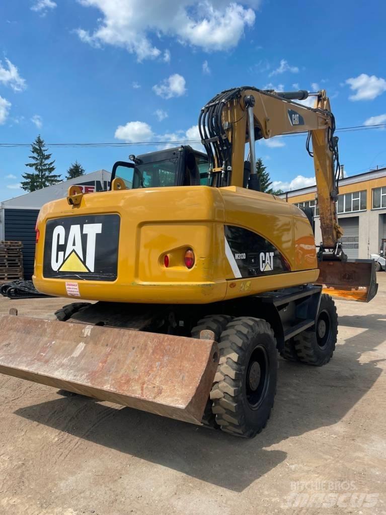 CAT M 313 D Escavadoras de rodas