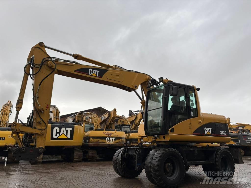 CAT M 313 C Escavadoras de rodas