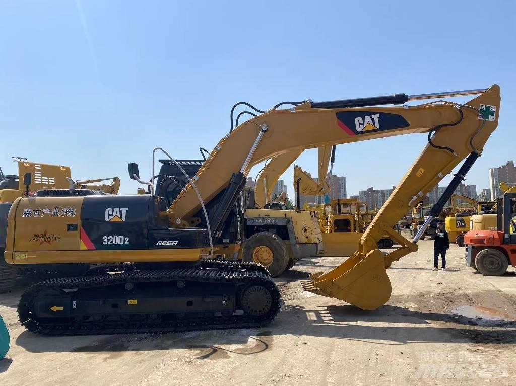 CAT 320 D 2 Escavadoras Midi 7t - 12t
