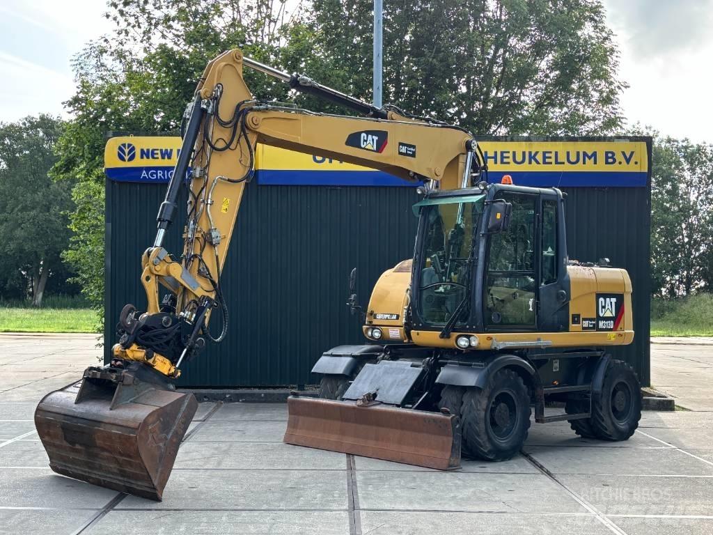 CAT M 313 D Escavadoras de rodas