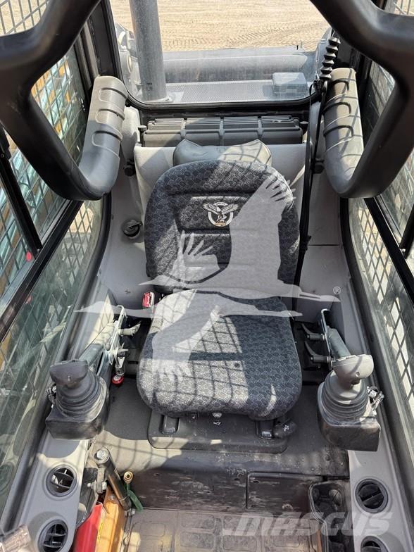 CASE TV450B Carregadoras de direcção deslizante